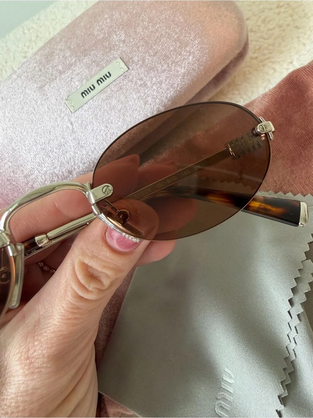 MIU MIU oval brown and silver sunglasses